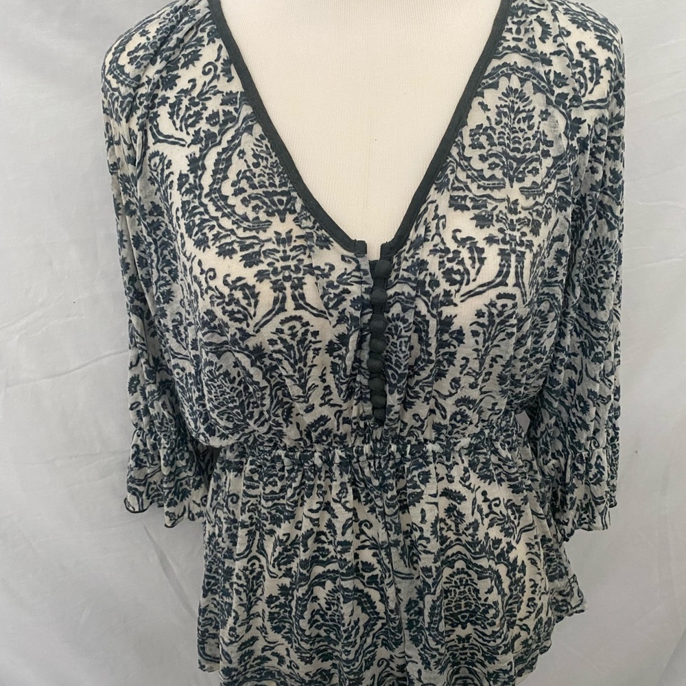 Dark green lacy-look top by Language Los Angeles
